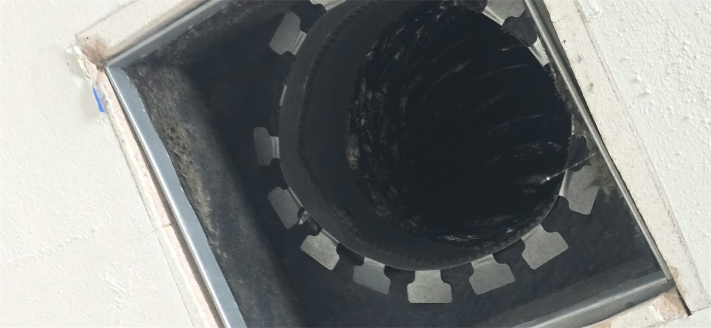 Ceiling air duct opening during air duct cleaning