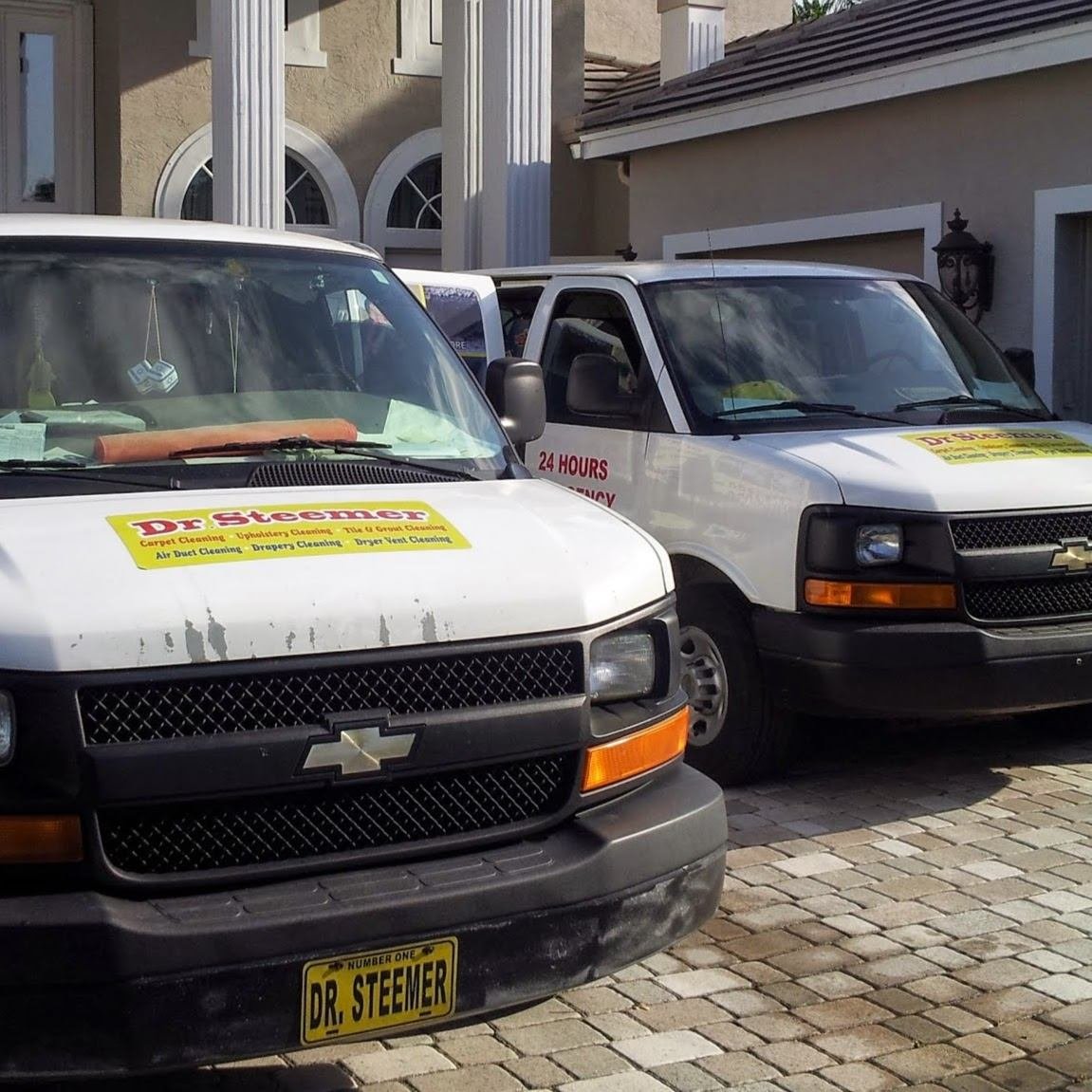 Dr Steemer carpet cleaning vans parked at a Miami home